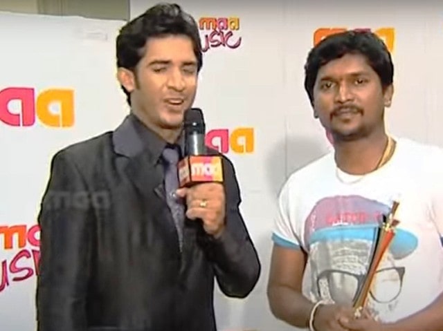 Prem Rakshith giving an interview after winning the CineMAA award