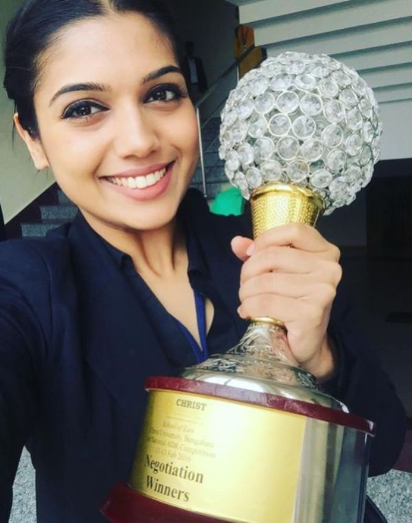 Samiksha Pednekar posing with her trophy after winning the SLCU National ADR Competition held at the Christ University in Bangalore