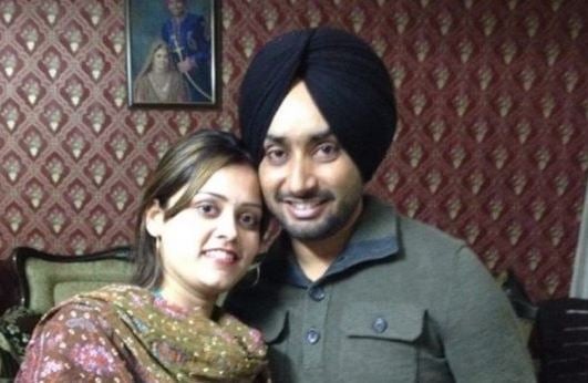 Satinder Sartaaj with his wife