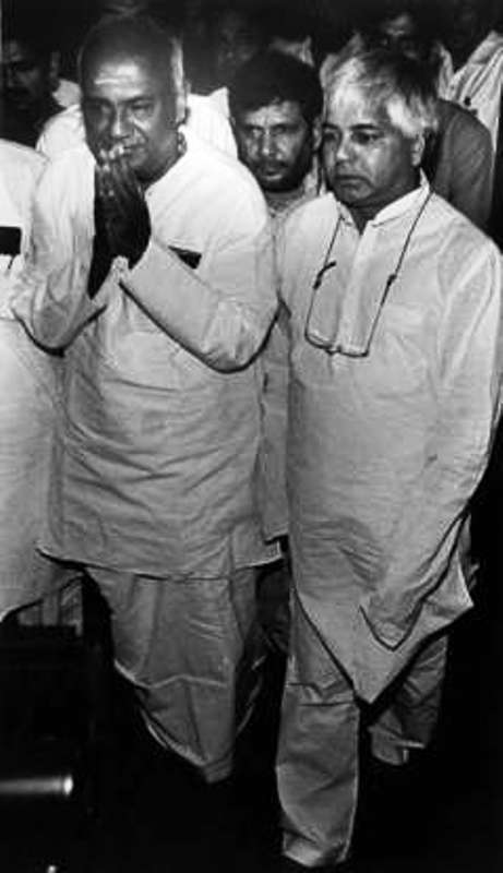 Sharad Yadav standing behind J. P. Narayan and Lalu Prasad Yadav