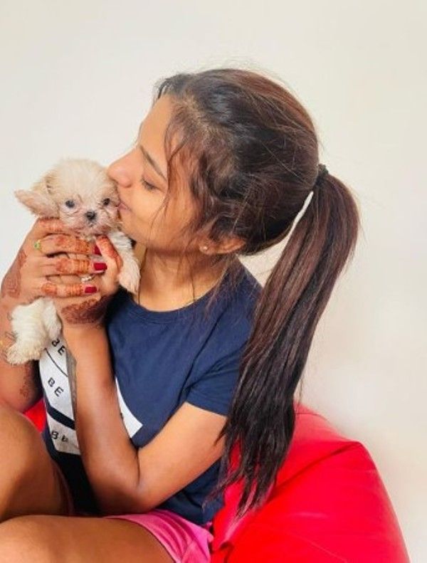 Sonu Srinivas Gowda and her pet dog, Breezer