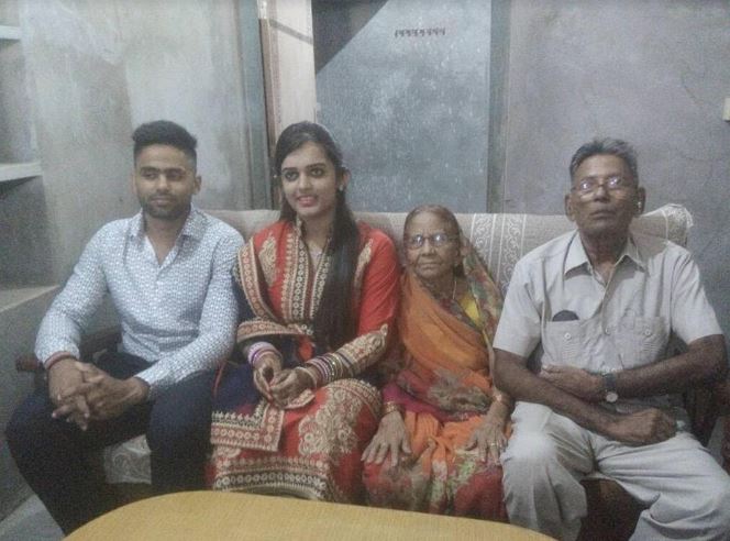 Suryakumar Yadav with his wife and grandparents