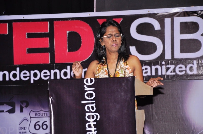 A photo of Mahalakshmi Iyer taken when she was giving a speech at TEDx