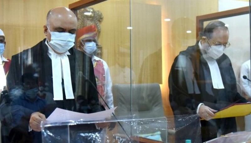 A photograph of Ahsanuddin Amanullah (left) taken when the Chief Justice of Andhra Pradesh High Court was administering the oath