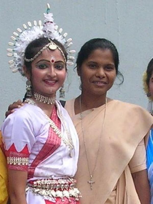 A teenage photograph of Annmary Tom; photo from her dance performance at her school's annual day event