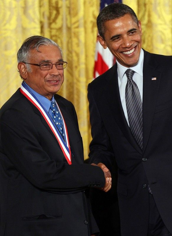 Barack Obama congratulating S. R. Srinivasa Varadhan on winning the National Medal of Science in 2010