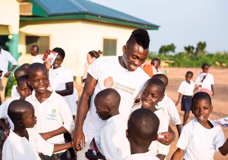 Christian Atsu meeting the children as the ambassador of the Arms Around The Child