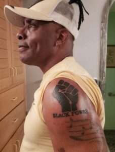 Coolio's black power tattoo