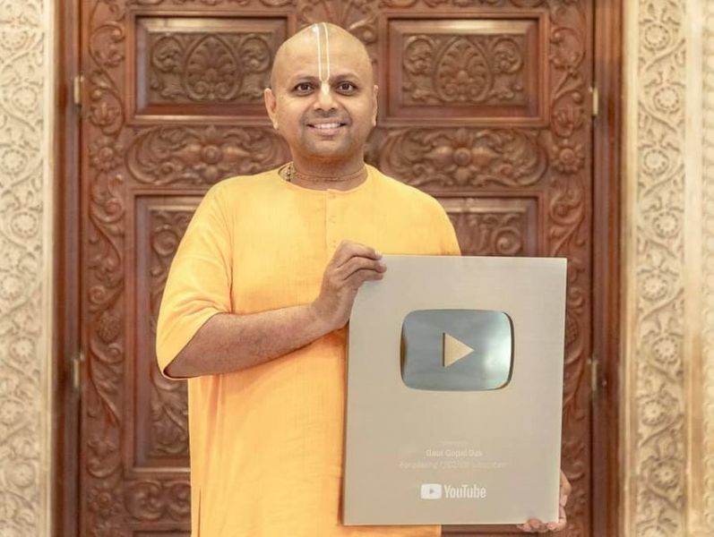 Gaur Gopal Das while holding the YouTube Gold Play Button (2018)