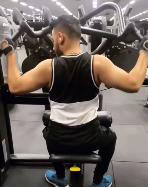 Harris working out in the gym