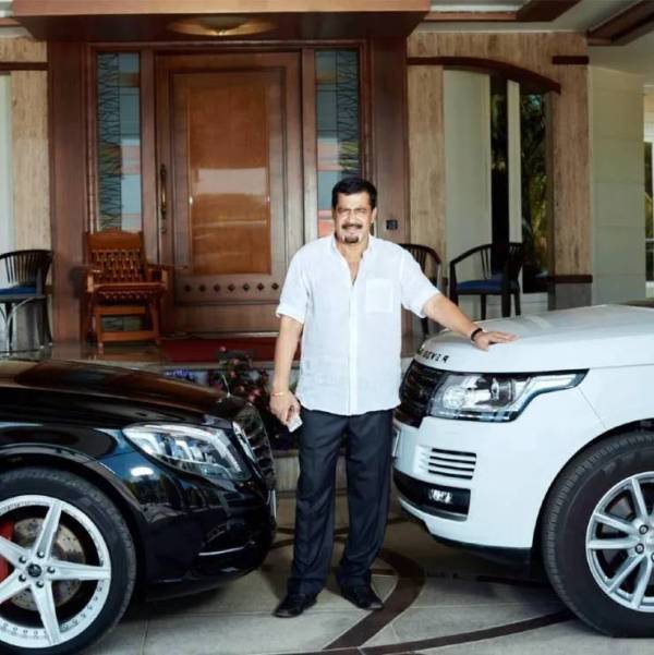 Muthappa Rai with his Mercedes-Benz S-Class (left) and Land Rover Range Rover