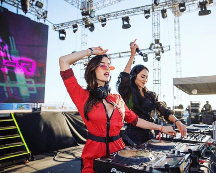 Natalia Barulich (left) DJing at the Baja Beach Fest in Mexico