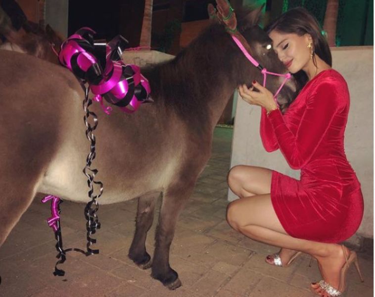 Natalia Barulich with her pet mini horse, Tali