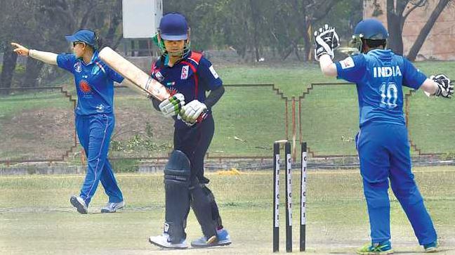 Neelam Bisht playing for India against Nepal