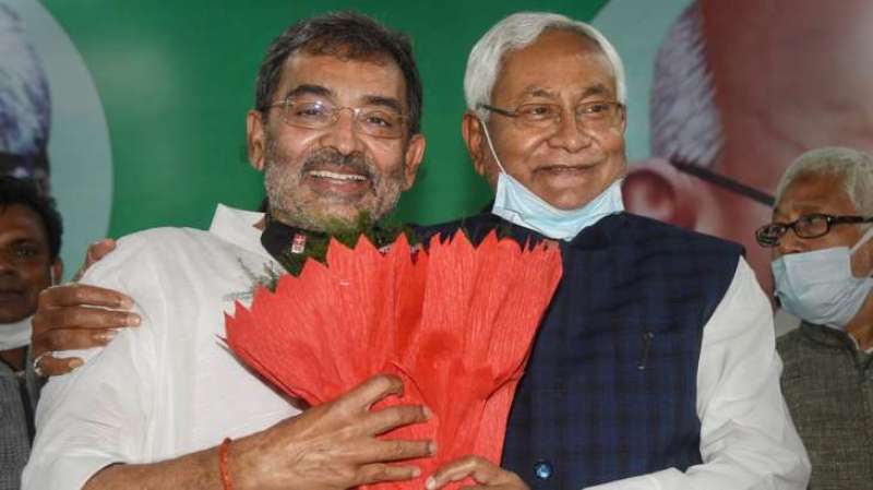 Nitish Kumar felicitating Upendra Kushwaha after the party merged with JD(U) in Patna on 14 March 2021