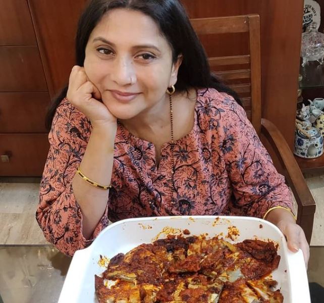Nivedita Joshi Saraf eating fish