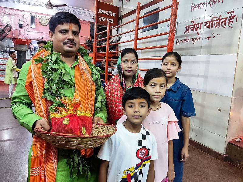 Rahul Prakash Kol with his wife and children