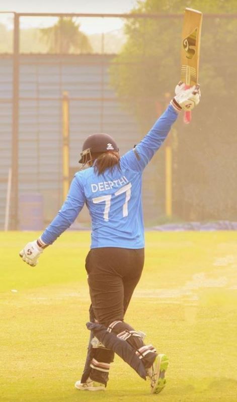Sneha Deepthi playing with the jersey number 77