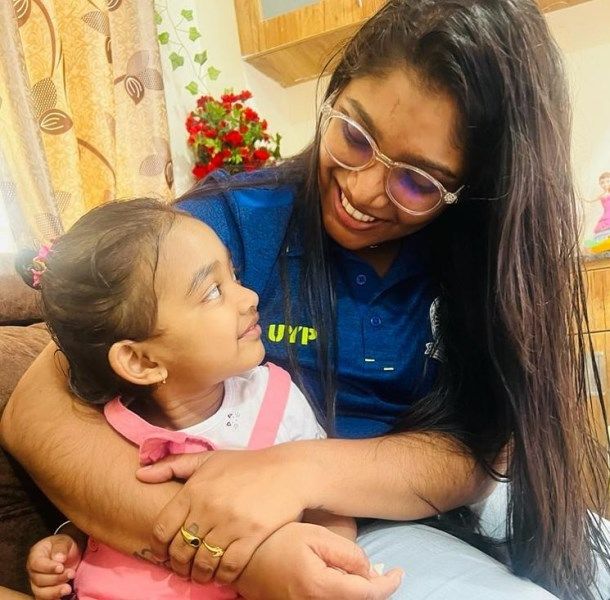 Sneha Deepthi with her daughter
