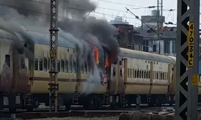 Train set on fire by students at Gaya station in Bihar