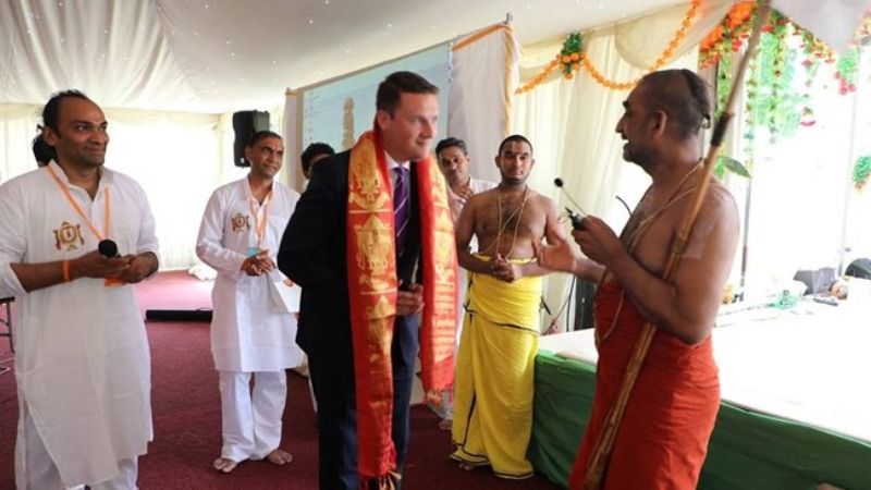Wesley Paul William Streeting greeting Chinna Jeeyar Swamiji greeting at Sri Yagam, an event organized in London, U. K.