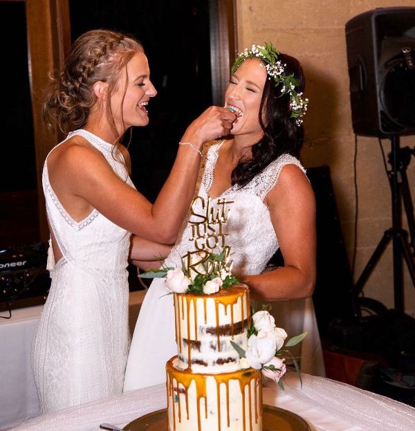A wedding picture of Megan Schutt and Jess Holyoake