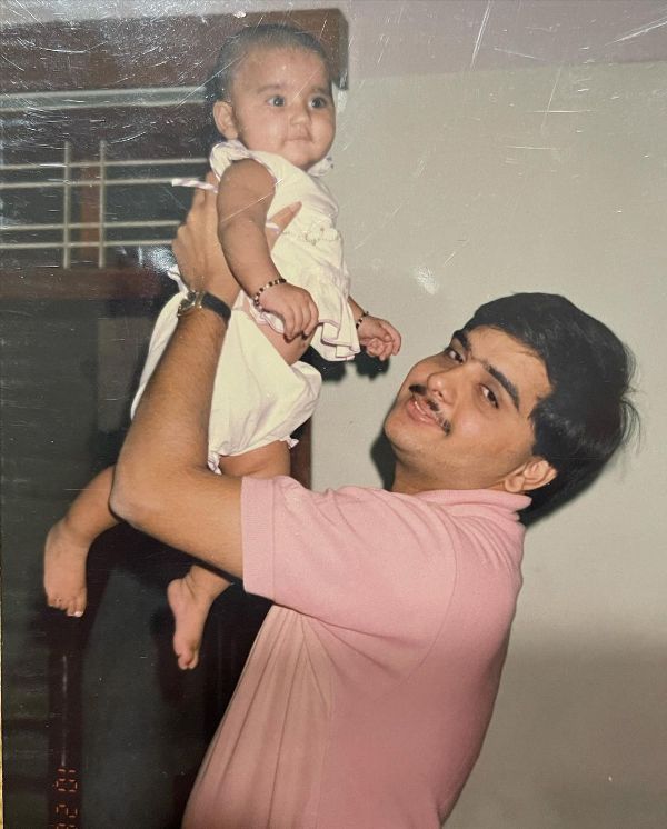 A childhood picture of Kritika Goel with her father