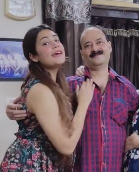 A picture of Kritika and her father