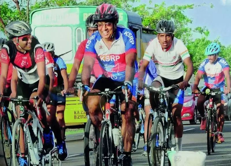 Bhaskar Rao riding on a cycle in Karnataka