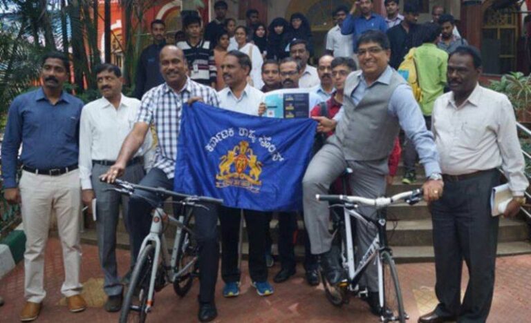 Bhaskar Rao with other policemen during Karnataka Darshan cycling event in Bengaluru