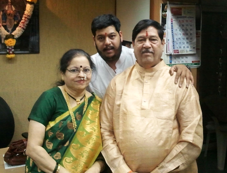 Girish Bapat with his wife and son