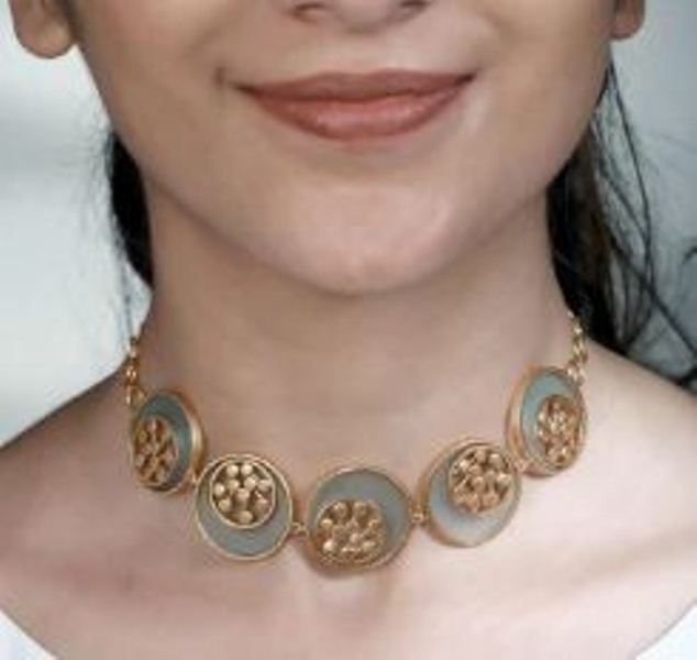Gold Toned Cyan Acrylic Tangent Choker with Inlaid Dotted Circles from her collection Minimal