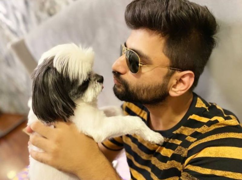 Harsh Gujral with his pet dog, Oreo