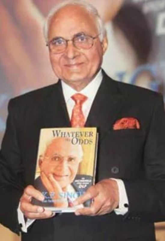 K. P. Singh while holding his book 'Whatever the Odds The Incredible Story Behind DLF'
