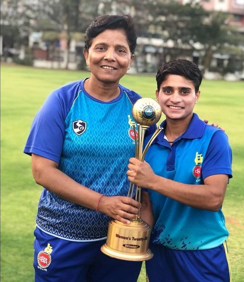 Laxmi Yadav holding the Women Cricket Under 23 T20 League Trophy