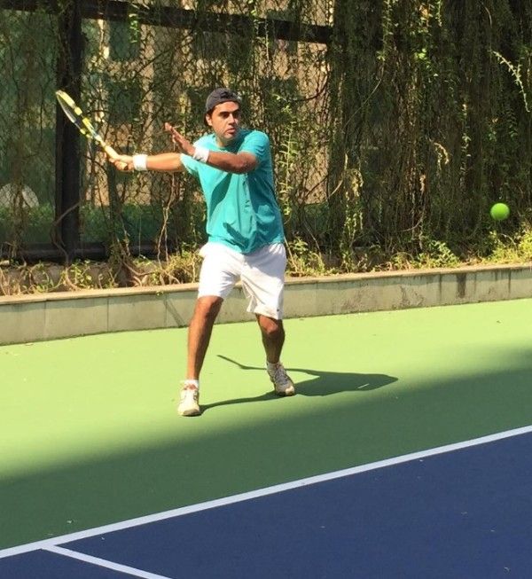 Raj Singh Chaudhary playing tennis