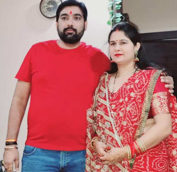 Sanjay Singh with his wife 