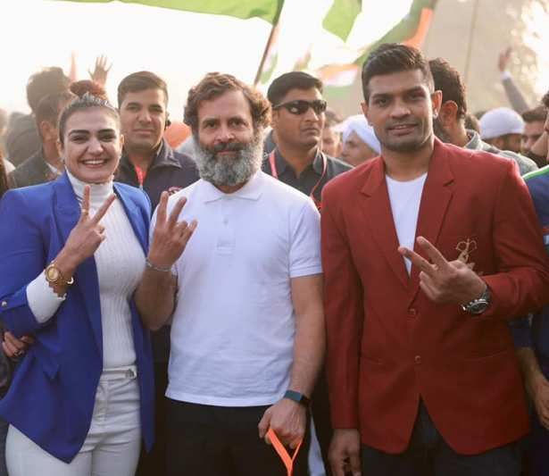 Saweety Boora and her husband, Deepak Niwas Hooda, posing with the Indian politician Rahul Gandhi during the Bharat Jodo Yatra in 2023