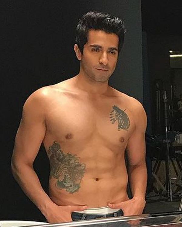 Sheheryar Munawar's tattoo on his chest and ribs