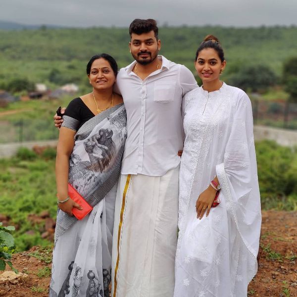 Spandana Palli with her mother and brother