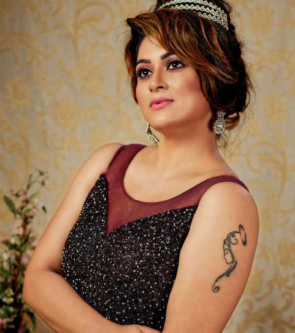 Sruthi Lakshmi's tattoo on her left arm