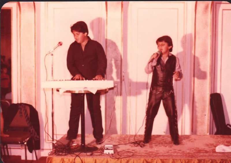 A childhood photograph of Adnan Sami Khan and Junaid Sami Khan (right) performing live in a cultural function
