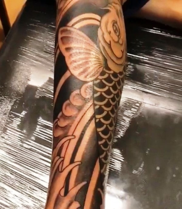 Abhishek Sinha's tattoo on his left leg
