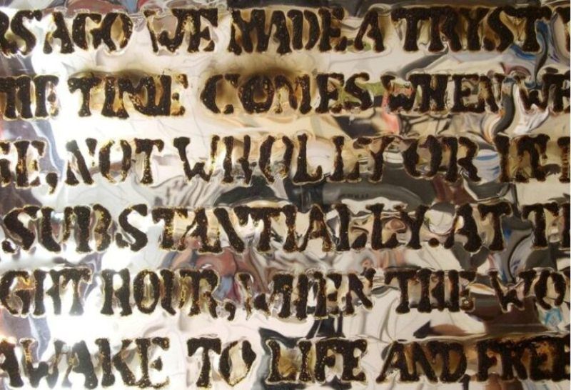 Burnt words in the installation ‘Public Notice’ by Jitish Kallat
