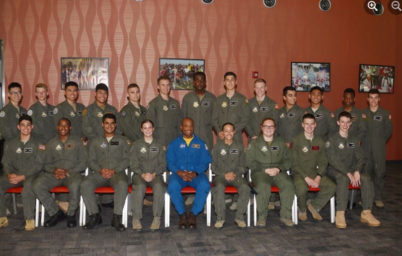 Commander Victor J. Glover Jr. with cadets at the Cadet Flight Training Ceremony held in the Martin Luther King Jr. Student Center on campus.