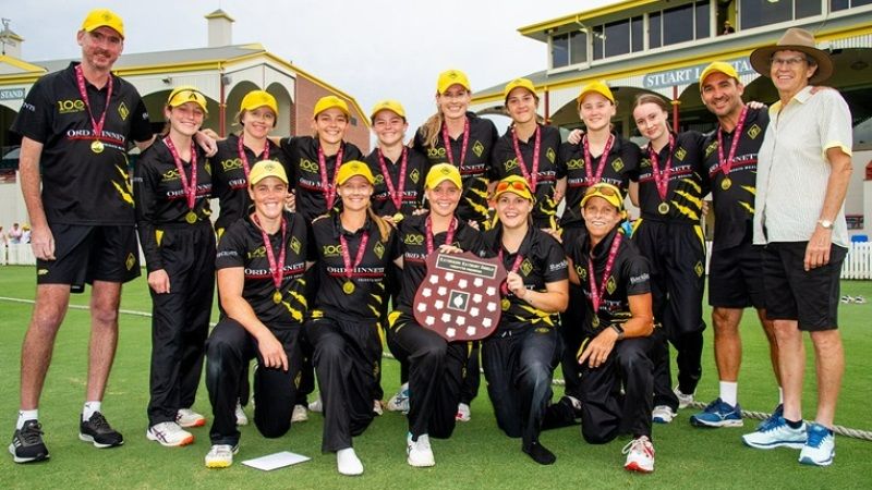 Grace Harris and the Western Suburbs District Cricket Club players with the Katherine Raymont Shield