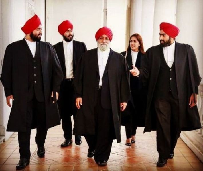 Manjit Singh Gill (second from left) with his father and siblings