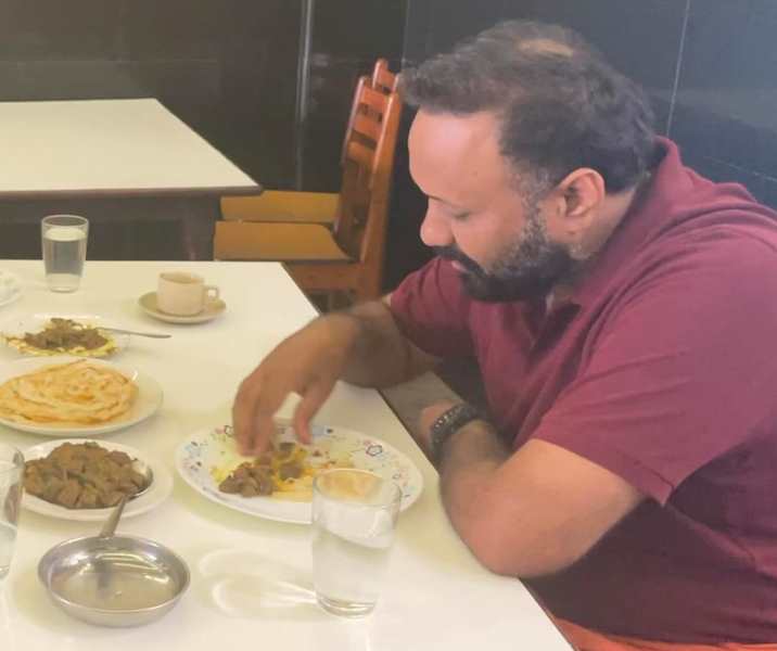 Omar Lulu was spotted eating Kerala parotta and mutton liver roast