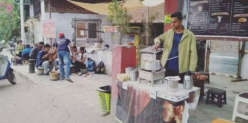 Prafull Billore making tea at his roadside stall in Ahmedabad, Gujarat