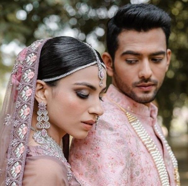 Simran Khosla with her husband, Unmakt Chand, on the day of their marriage